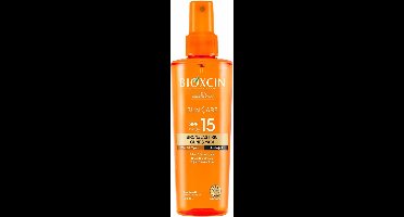 Bioxcin Zonnebrandolie SPF 15 – Bronzende zonneolie – Voor alle huidtypes – Hypoallergeen – Met cacaoboter & wortelolie – Natuurlijke bruining & intense hydratatie – 200 ml