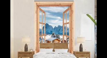 Behang - Fotobehang Doorkijk - Winterlandschap - Huisje - Bergen - Uitzicht - Breedte 145 cm x hoogte 220 cm