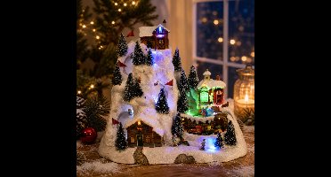 Lumineo Kerstdorp kerst tafereel - skipiste - met verlichting en beweging - 27,5 cm - polyresin